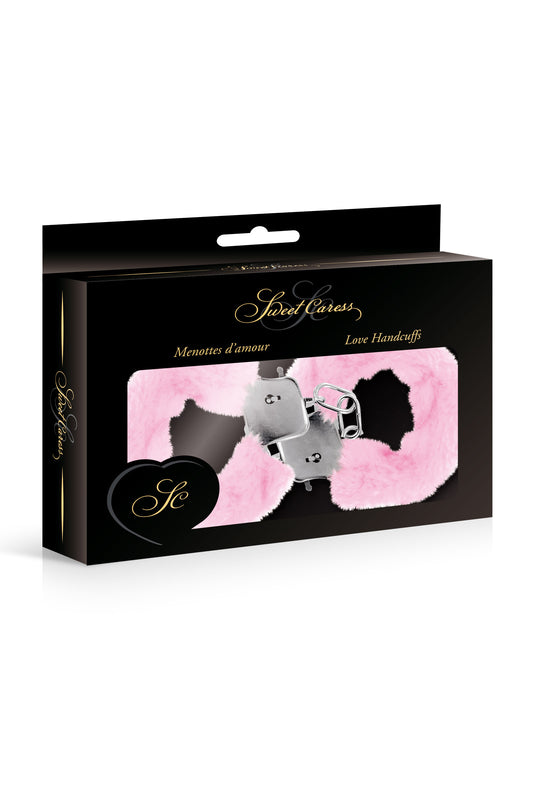Menottes en fourrure et métal, rose de la marque Sweet Caress dans son emballage