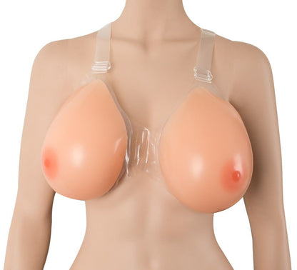 Des faux seins en silicone à bretelles pour travestis poids 2400 g de la marque Cottelli Accessories de face sur un mannequin