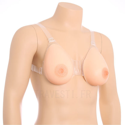 Une paire de faux seins en silicone à placer dans le soutien-gorge en forme de goutte d'eau pour une poitrine volumineuse et réaliste.