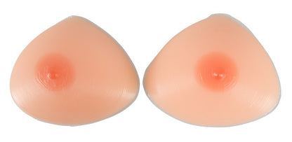 Faux seins en silicone pour travestis, 1200 g marque Cottelli Accessories vus de face