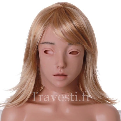Emily est un masque complet de femme en silicone alimentaire ultra-réaliste. Le teint du masque est clair. À maquiller selon ses goûts.